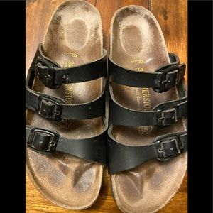 Birkenstock’s size 39 black leather three straps